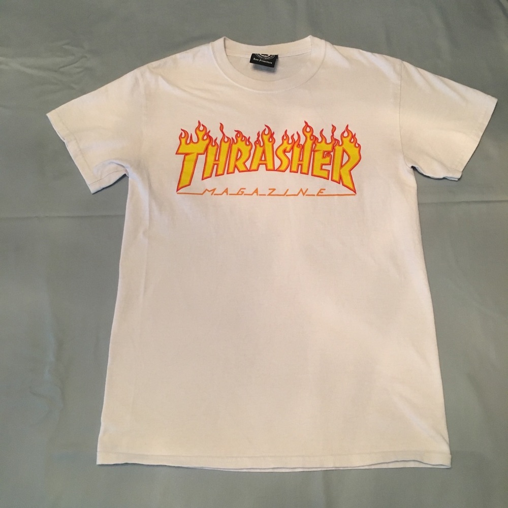 white thrasher shirt with orange/red flames.